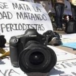 cámaras fotográficas ley periodistas